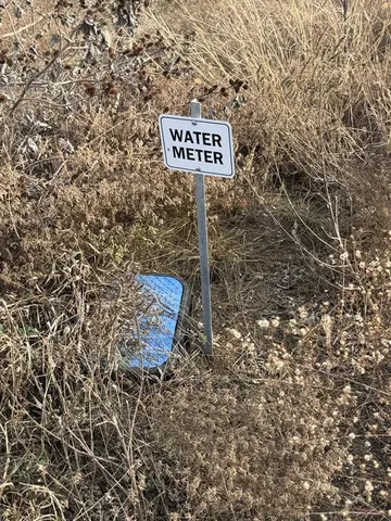 a sign broad on the side of the road