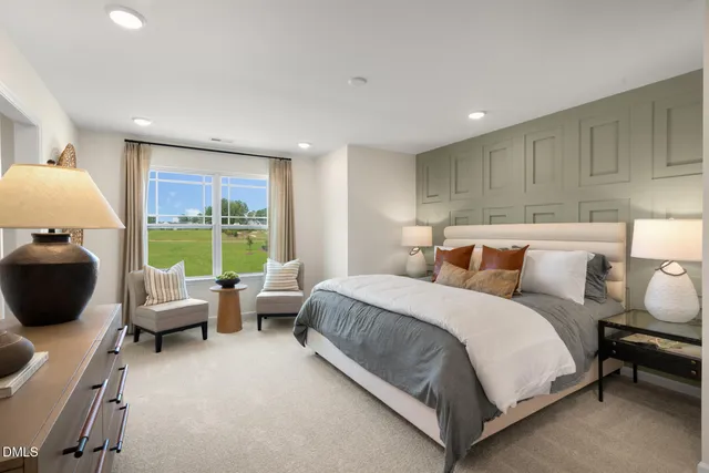 a bed room with a bed and a couch