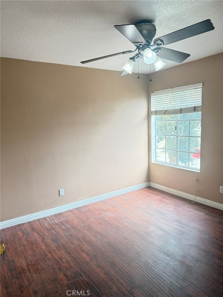 77 North Michigan Avenue, Unit 3 Pasadena, CA 91106 - Photo 11 of 11 wooden floor in an empty room with a window