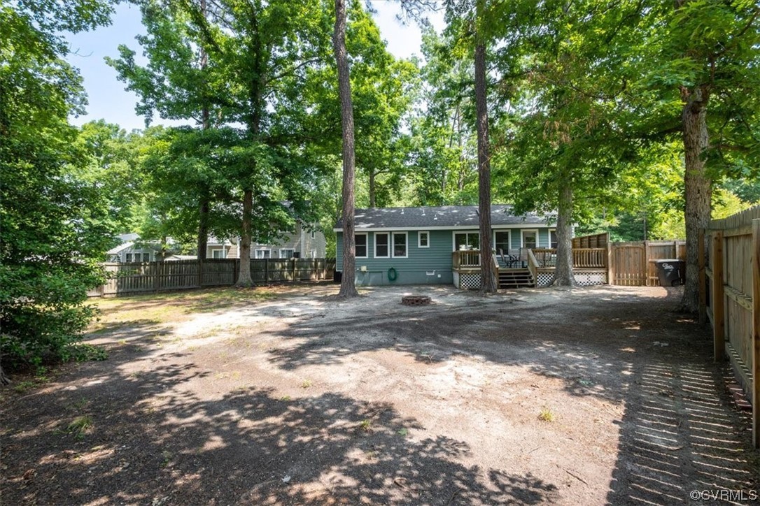 10712 Genlou Road Chesterfield, VA 23832 - Photo 11 of 43 a front view of a house with a yard