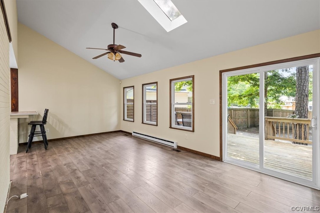 10712 Genlou Road Chesterfield, VA 23832 - Photo 18 of 43 a view of a livingroom with wooden floor and a ceiling fan