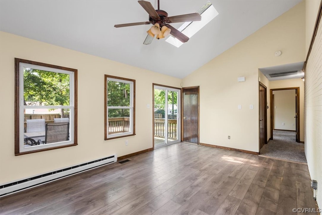 10712 Genlou Road Chesterfield, VA 23832 - Photo 23 of 43 a view of an empty room with a window and wooden floor