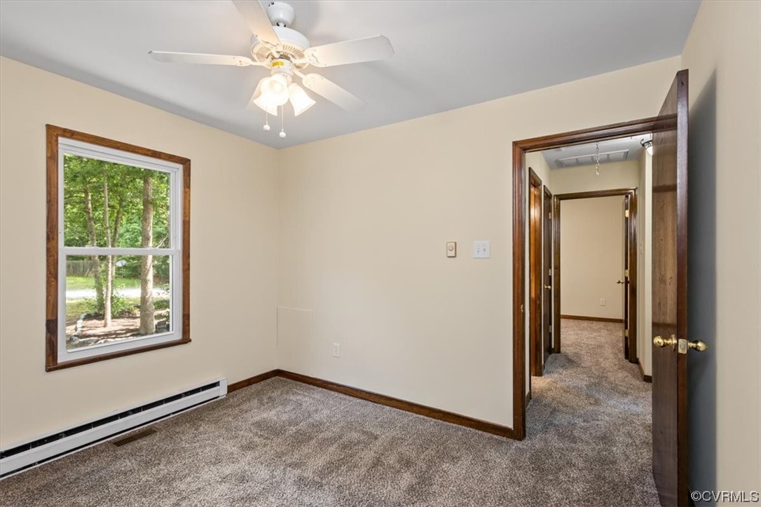 10712 Genlou Road Chesterfield, VA 23832 - Photo 36 of 43 an empty room that has a window and a chandelier fan
