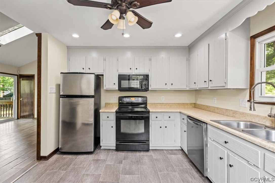 10712 Genlou Road Chesterfield, VA 23832 - Photo 5 of 43 a kitchen with a refrigerator sink and cabinets