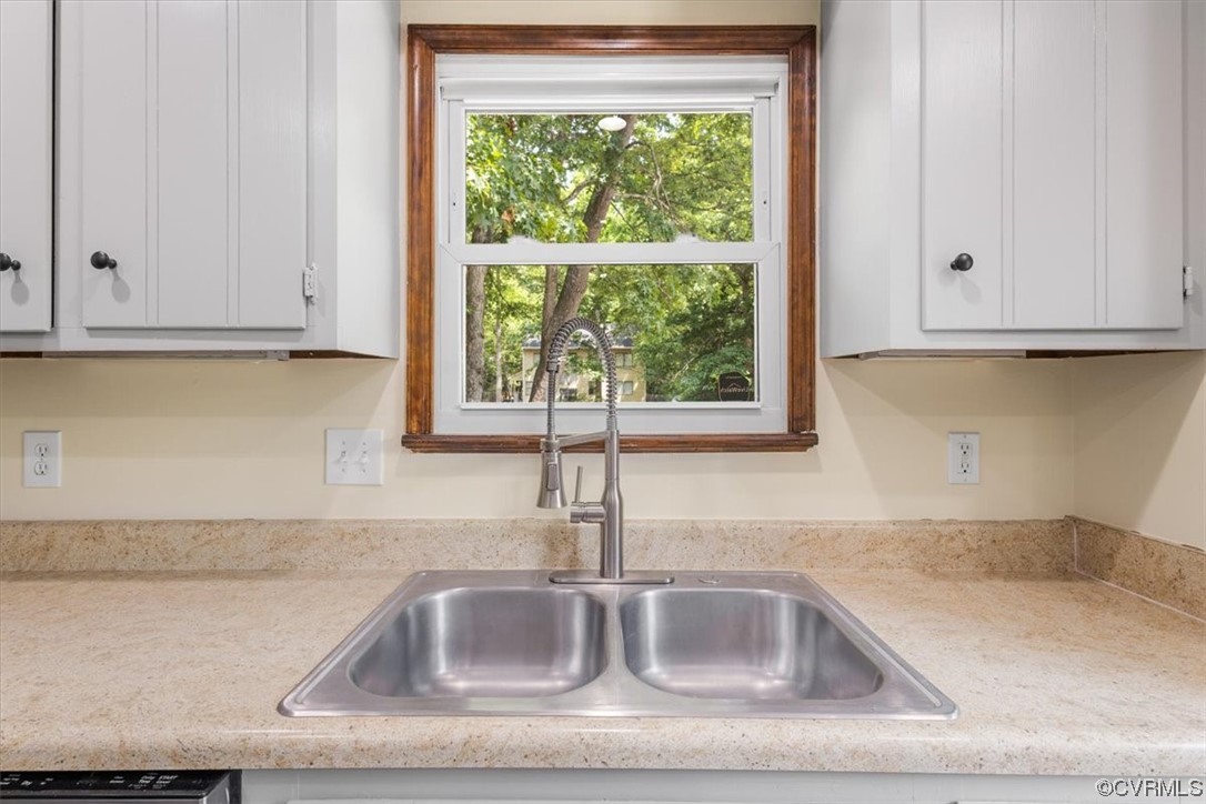 10712 Genlou Road Chesterfield, VA 23832 - Photo 6 of 43 a close view of sink and tap