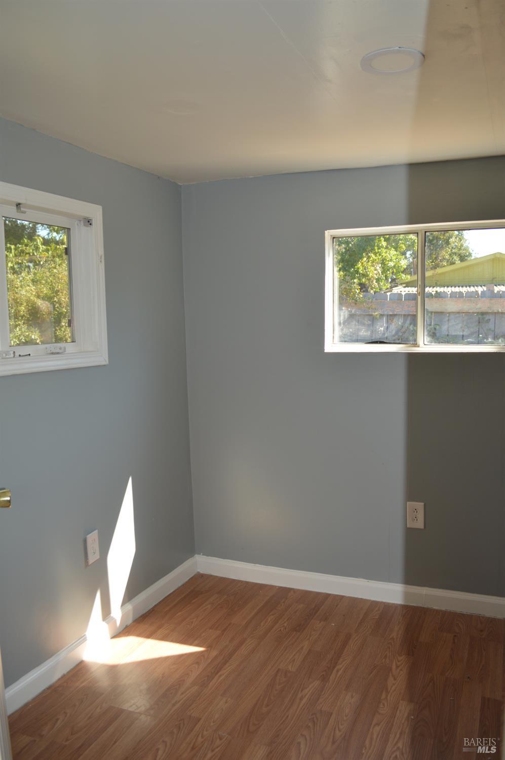 3525 Madrone Street Clearlake, CA 95422 - Photo 6 of 13 a view of a livingroom with a window