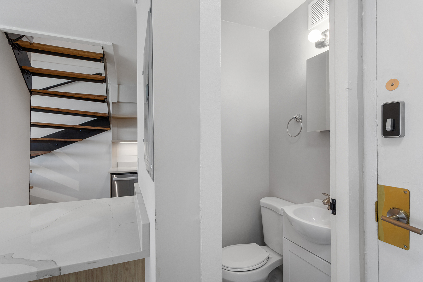 6166 North Sheridan Road, Unit 22F Chicago, IL 60660 - Photo 7 of 22 a bathroom with a sink toilet and shower