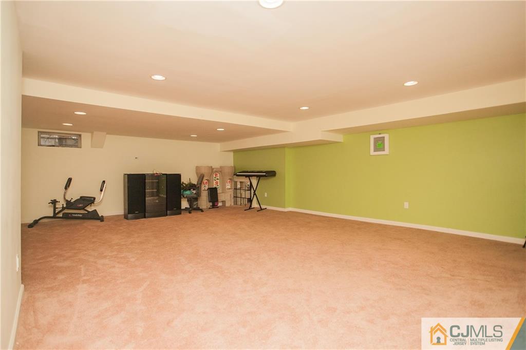 1006 Timber Oaks Road Edison, NJ 08820 - Photo 12 of 13 a view of a livingroom with a staircase
