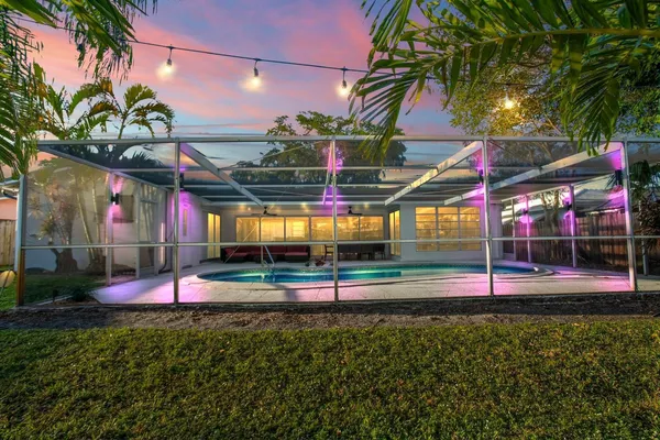 a view of a swimming pool with a patio