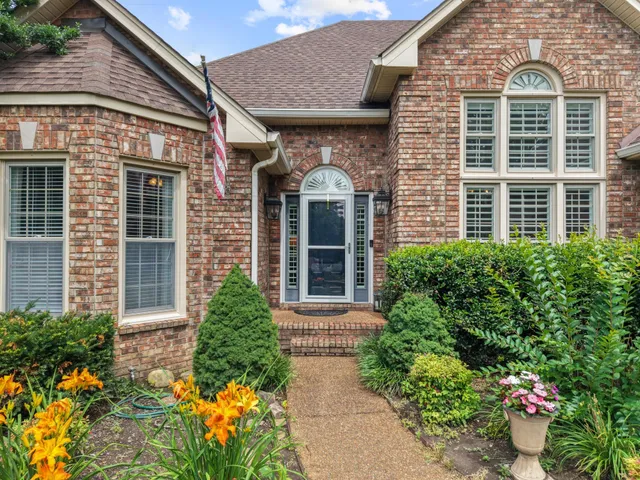a living room with furniture fireplace and a flat screen tv