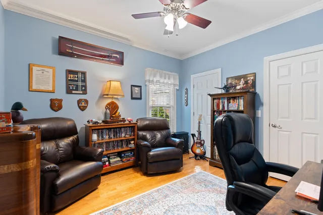 a workspace with furniture and a window