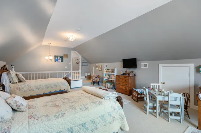 a view of a livingroom with wooden floor