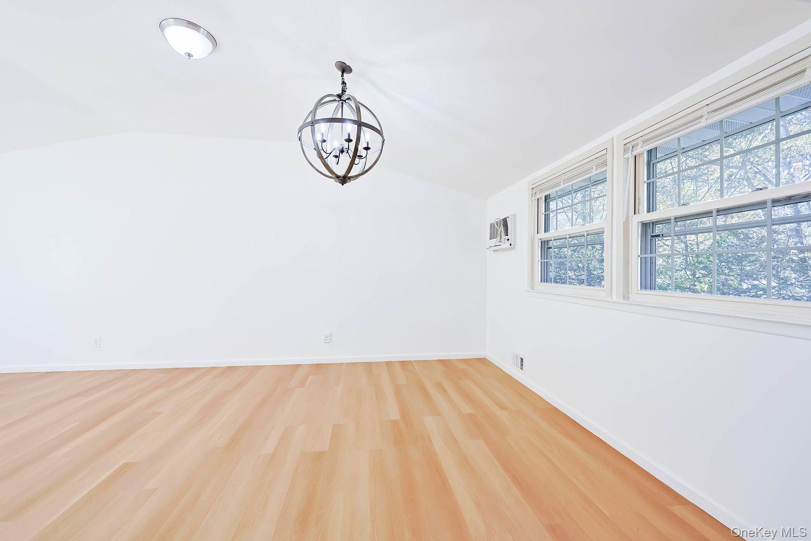 15 Mayflower Lane East Setauket, NY 11733 - Photo 17 of 23 a view of a room with window