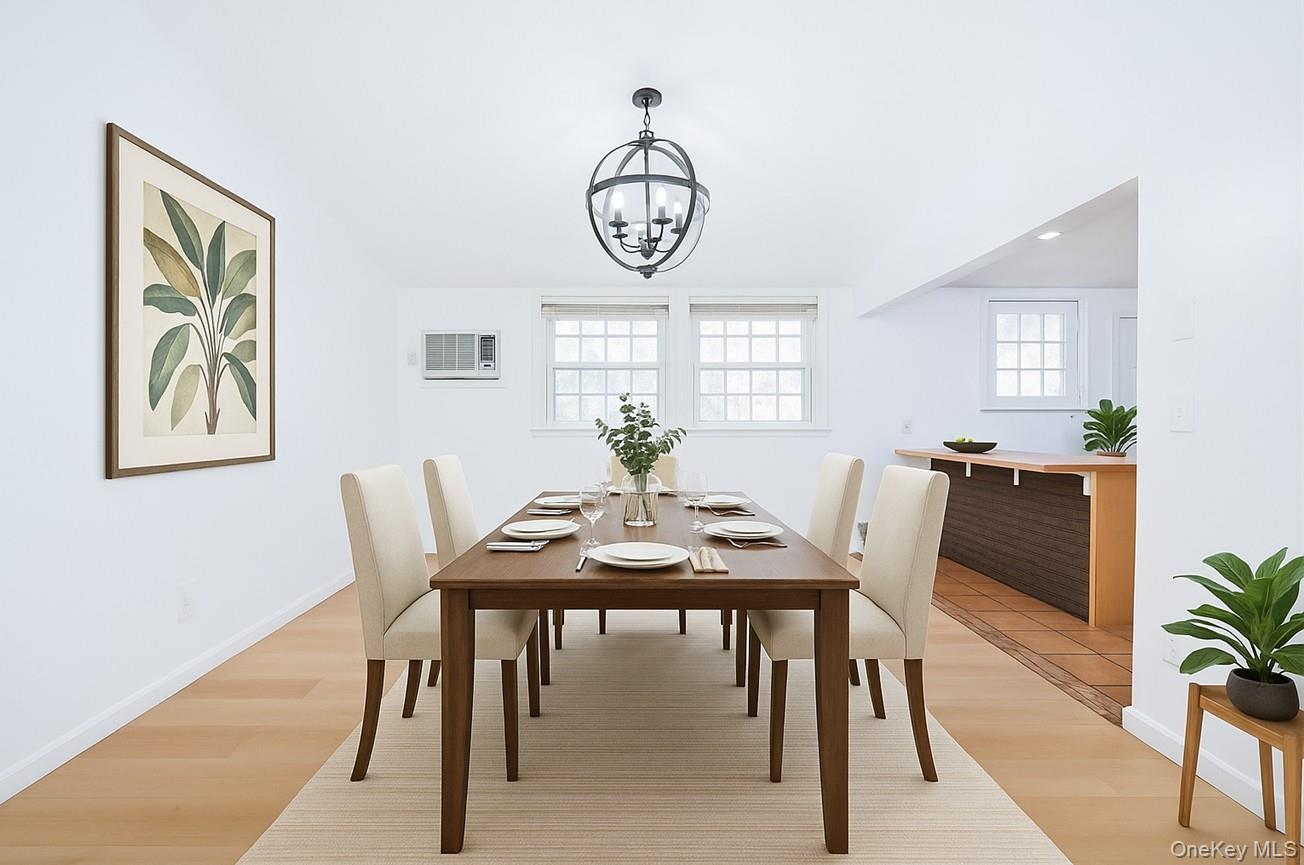 15 Mayflower Lane East Setauket, NY 11733 - Photo 5 of 23 a view of a dining room with furniture window and wooden floor