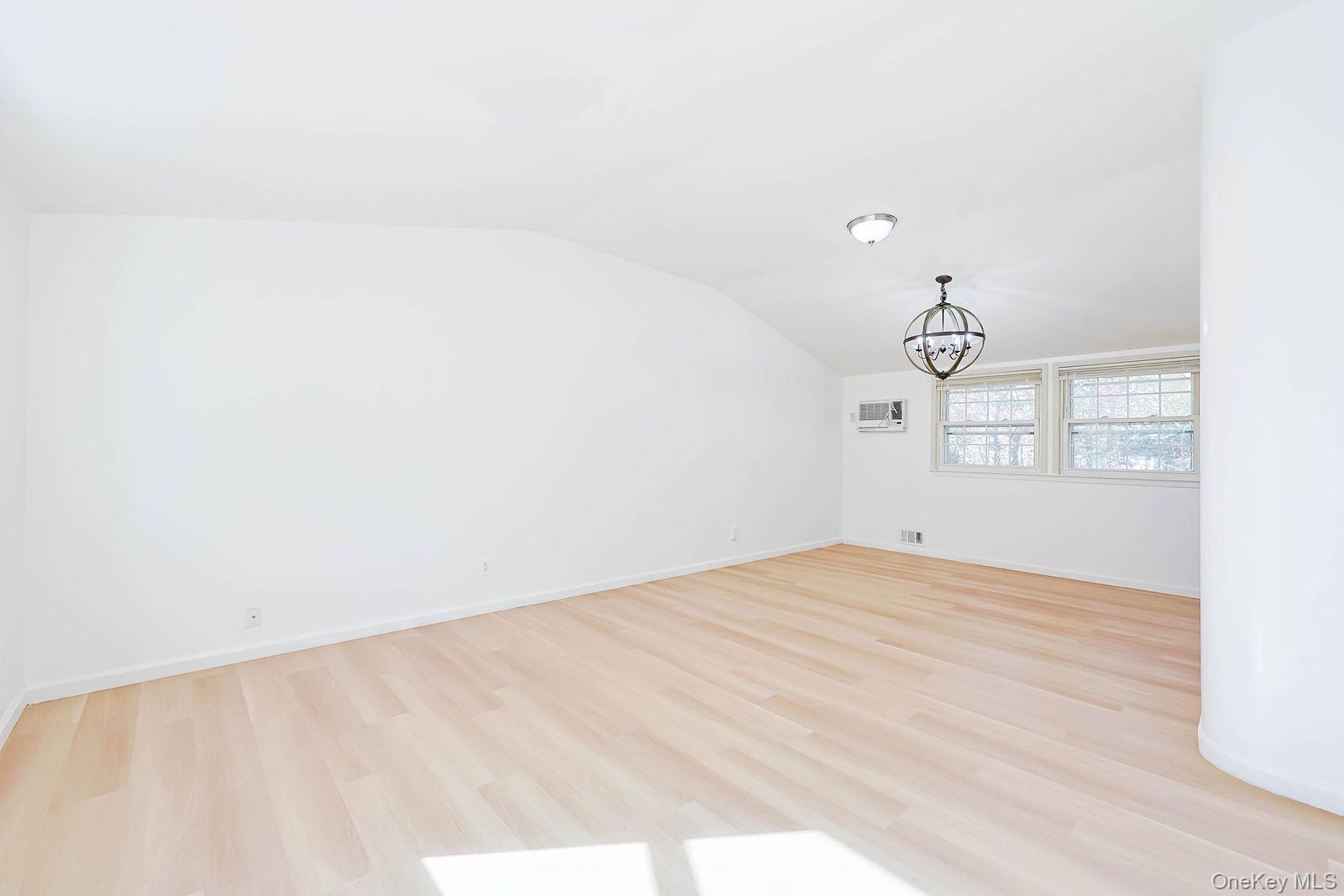 15 Mayflower Lane East Setauket, NY 11733 - Photo 9 of 23 a view of empty room with window