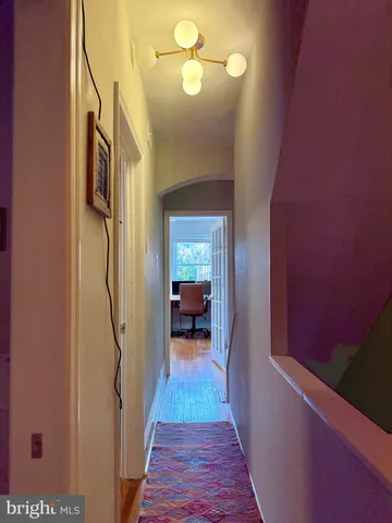 a view of a hallway view with staircase
