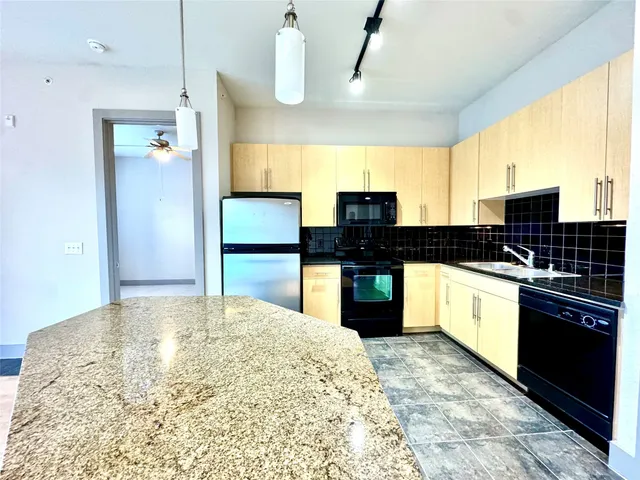 a room with table and a mirror