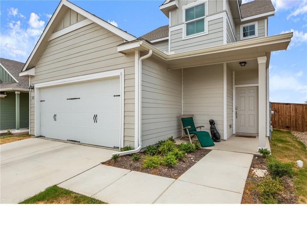 328 Majestic Cedar Court Liberty Hill, TX 78642 - Photo 2 of 31 a view of backyard of house
