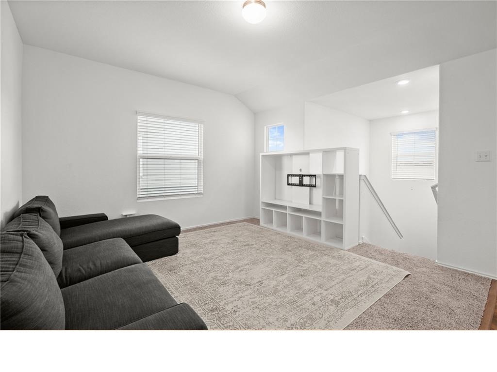 328 Majestic Cedar Court Liberty Hill, TX 78642 - Photo 24 of 31 a living room with furniture and a window