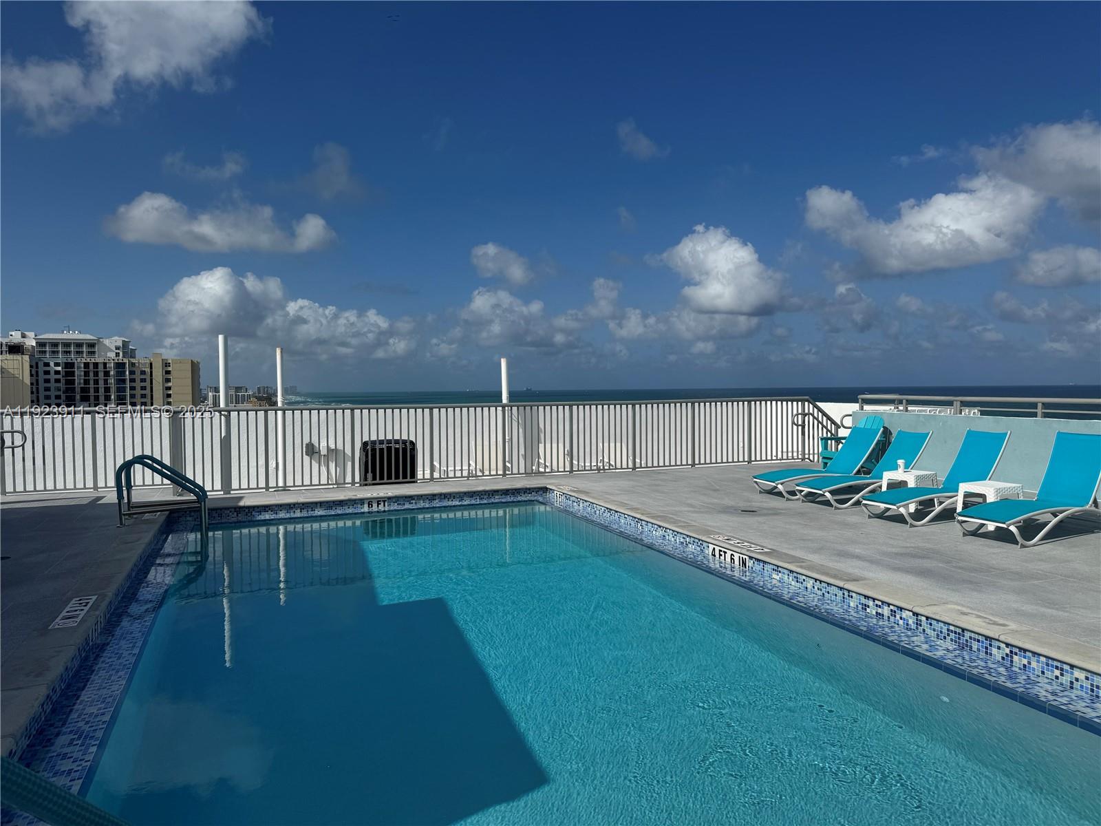 400 North Surf Road, Unit RGB Hollywood, FL 33019 - Photo 3 of 17 a swimming pool with barbeque oven