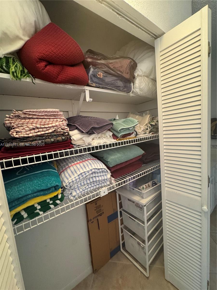 400 North Surf Road, Unit RGB Hollywood, FL 33019 - Photo 10 of 17 a kitchen with a stove and a microwave