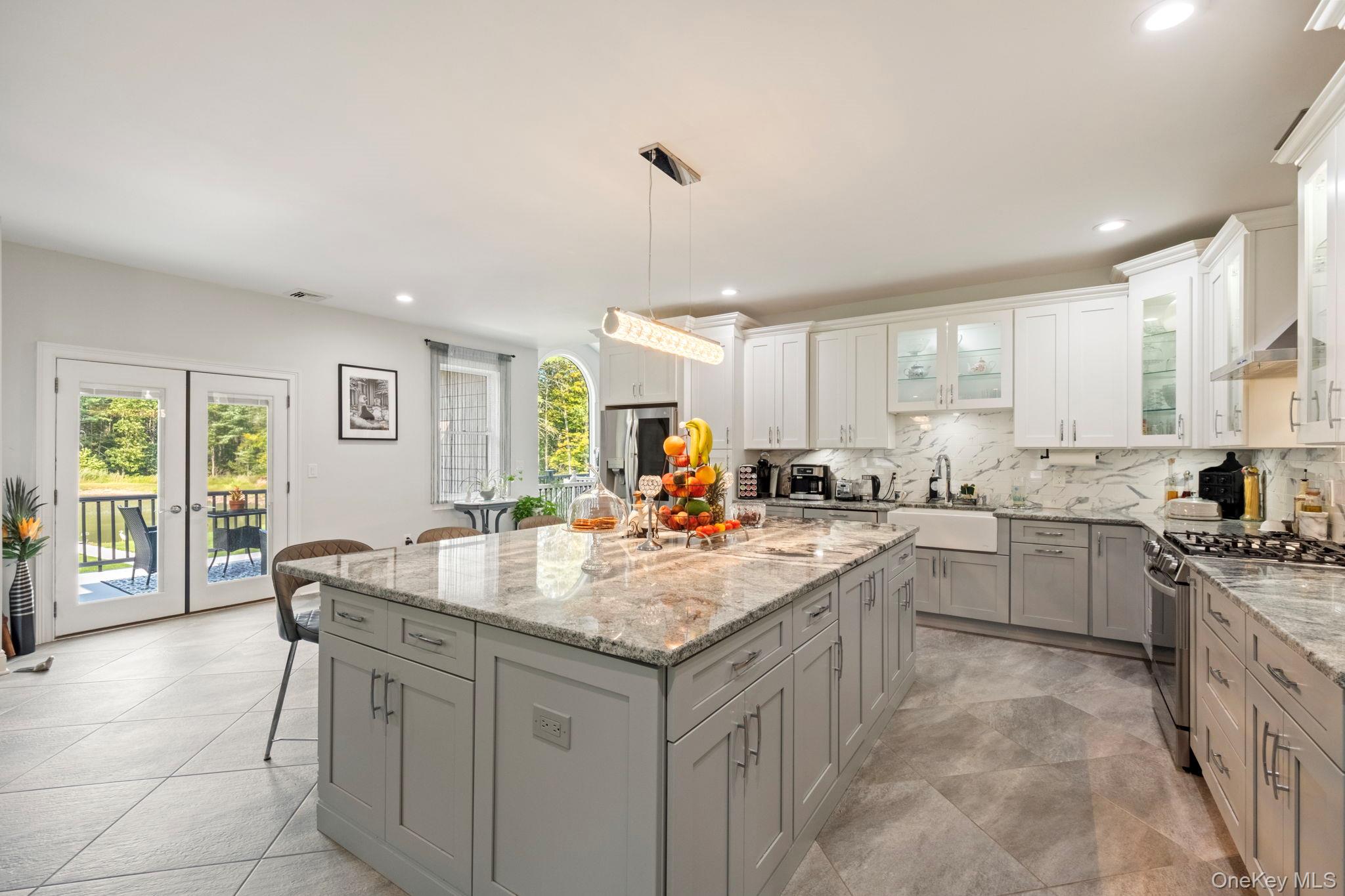 174 Webber Road Coxsackie, NY 12058 - Photo 15 of 50 a kitchen with a stove sink and cabinets