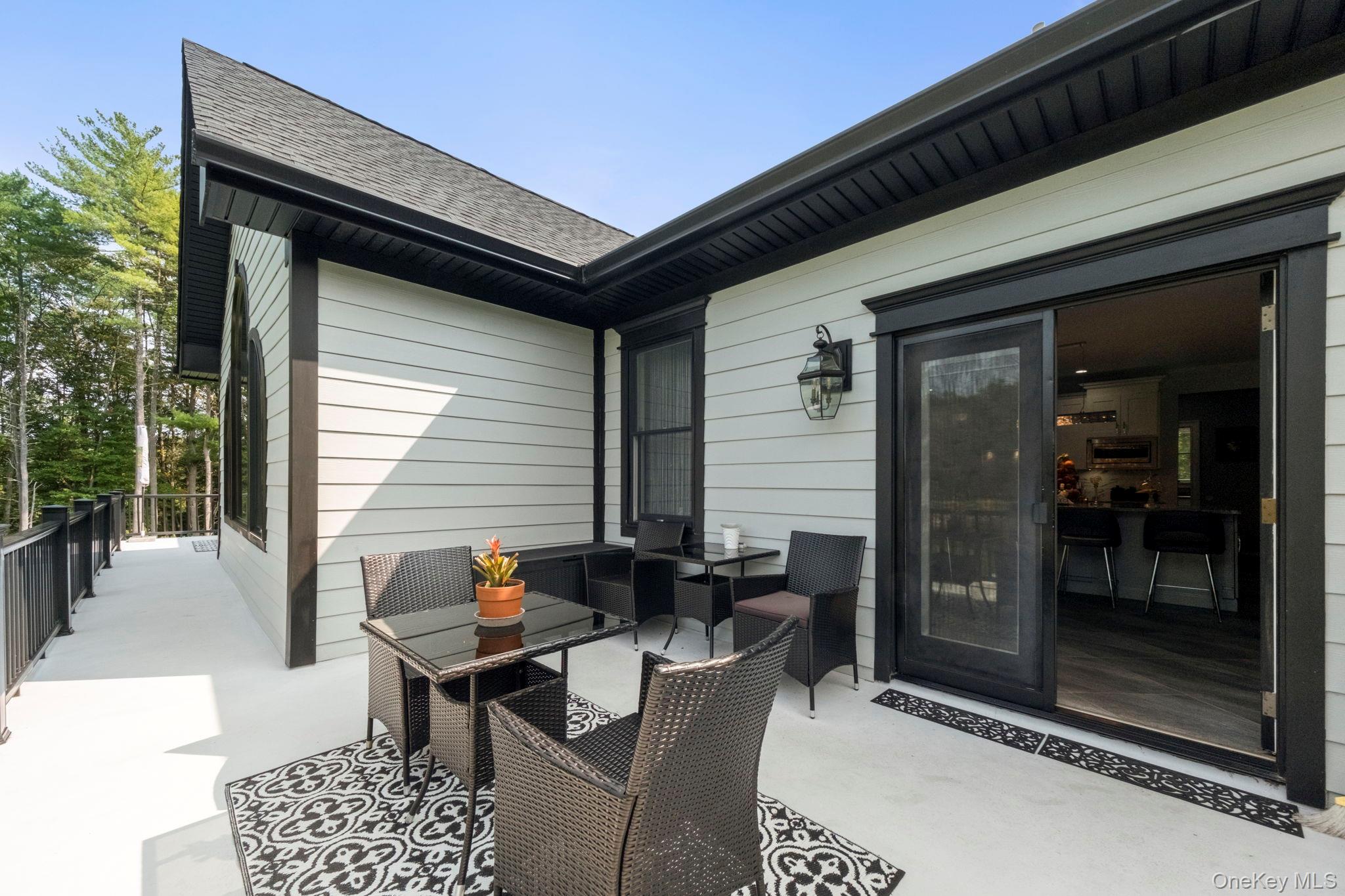 174 Webber Road Coxsackie, NY 12058 - Photo 40 of 50 a backyard of a house with outdoor seating