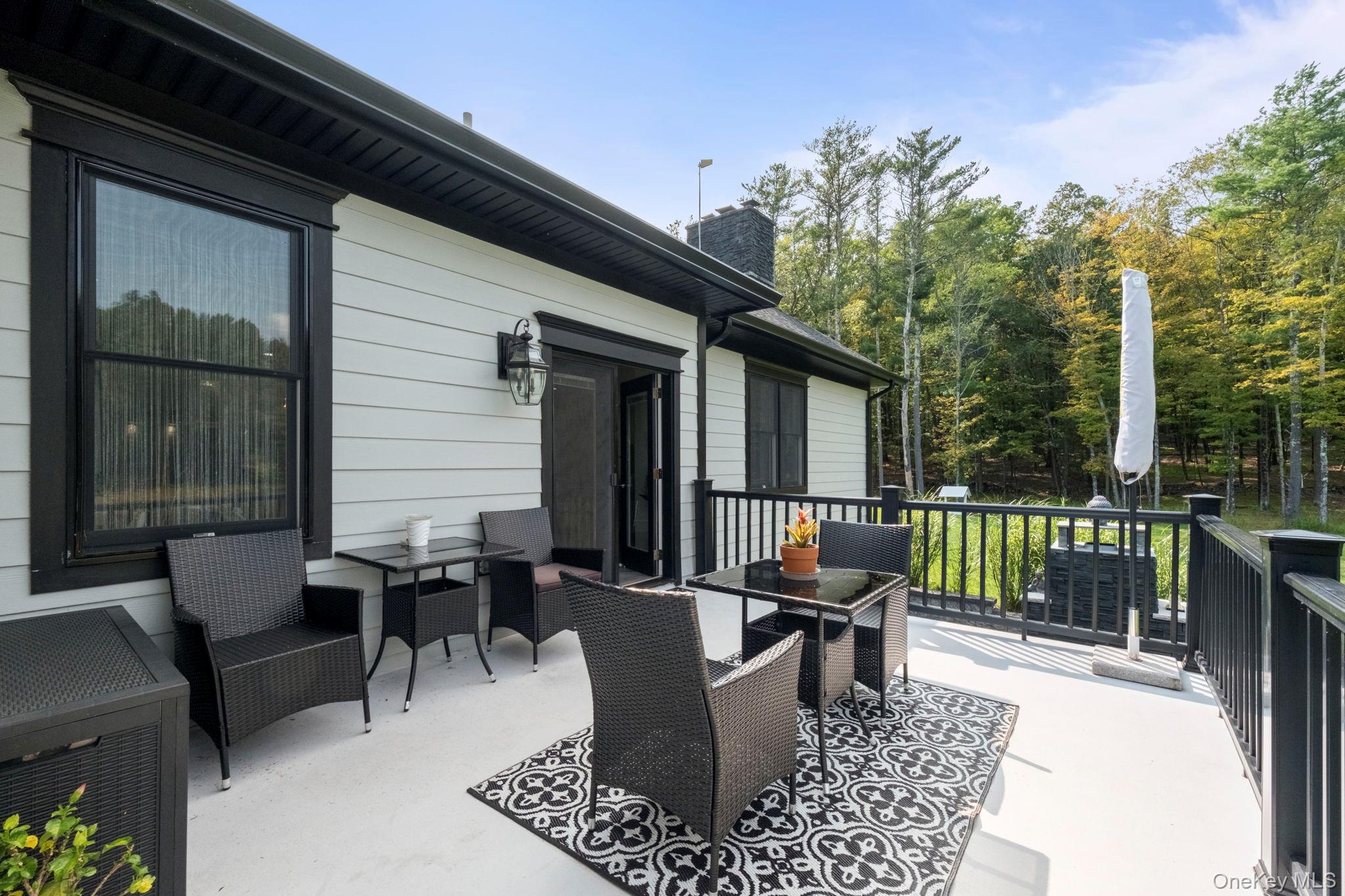 174 Webber Road Coxsackie, NY 12058 - Photo 41 of 50 a view of a chairs and table in patio
