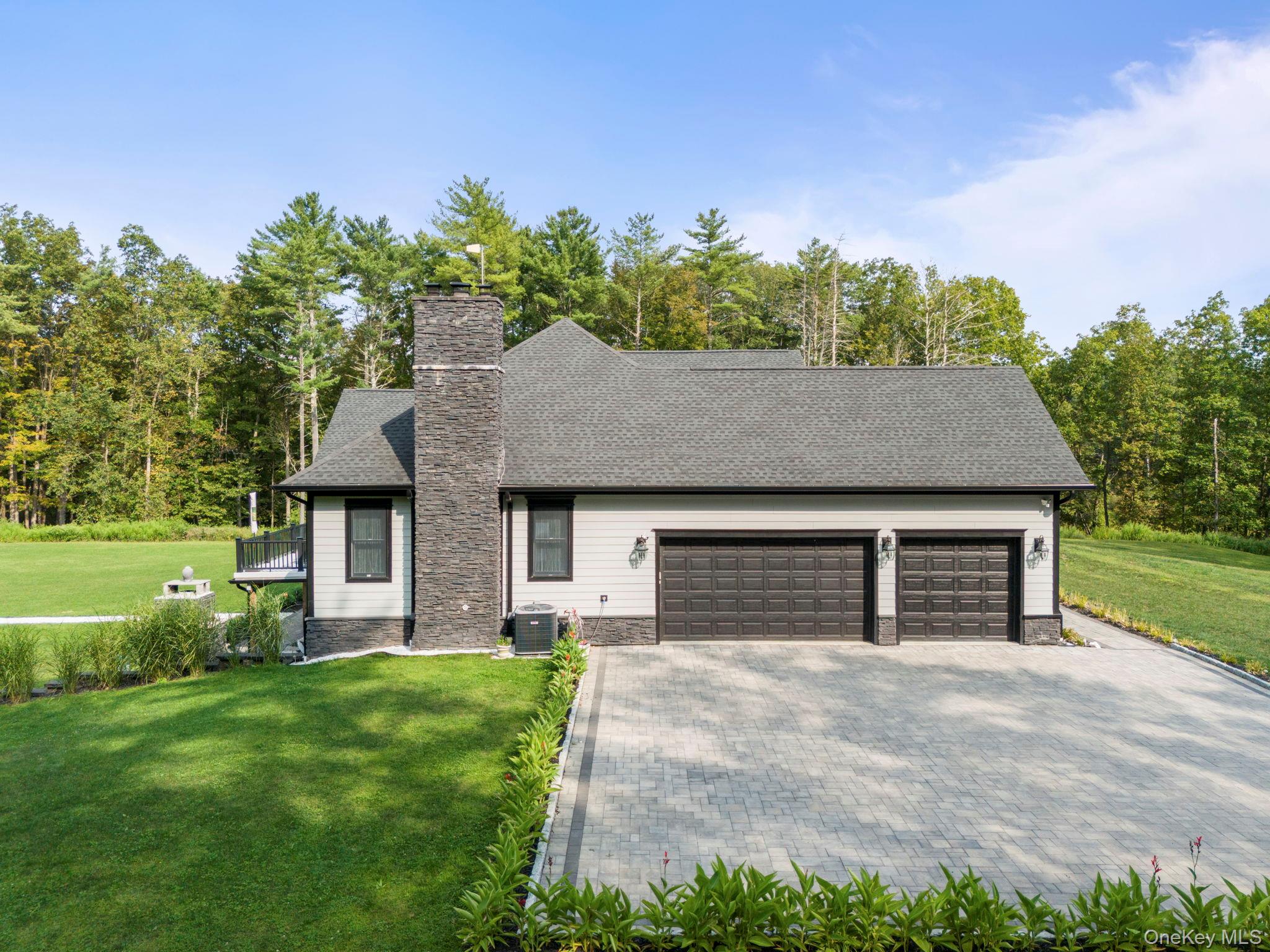 174 Webber Road Coxsackie, NY 12058 - Photo 46 of 50 a house view with a garden space