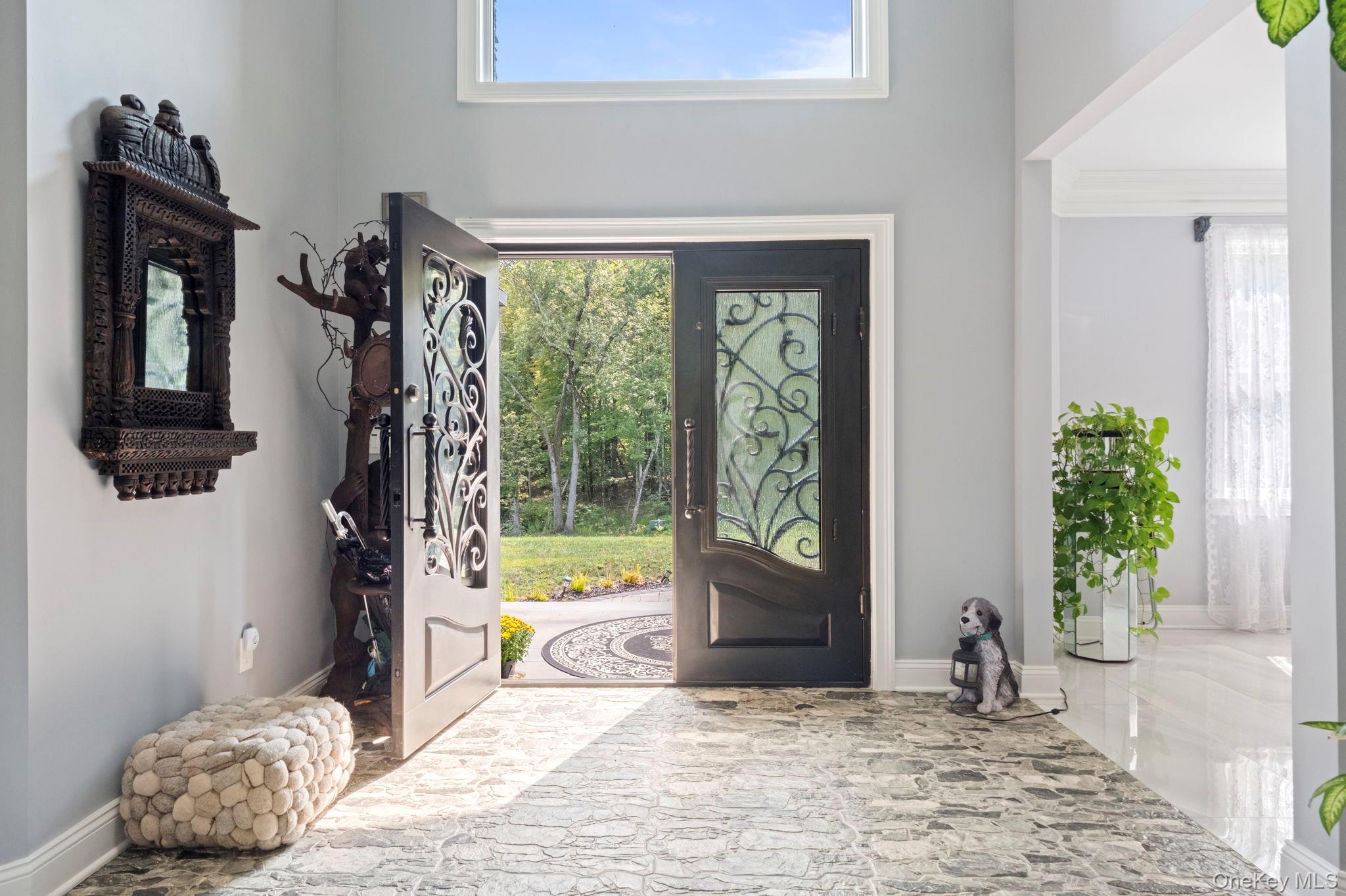 174 Webber Road Coxsackie, NY 12058 - Photo 5 of 50 a view of a bedroom with a bed and glass door