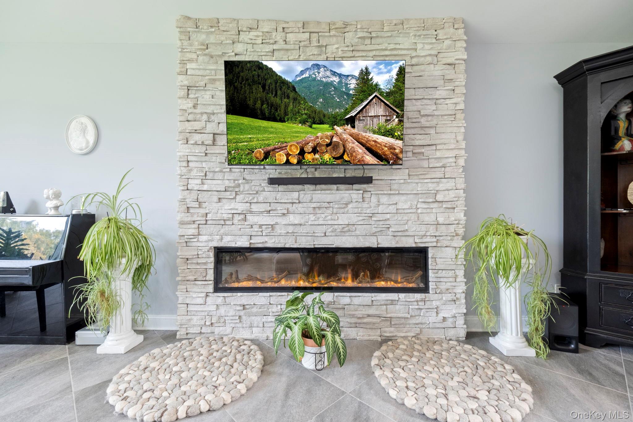 174 Webber Road Coxsackie, NY 12058 - Photo 9 of 50 a living room with furniture and a fireplace
