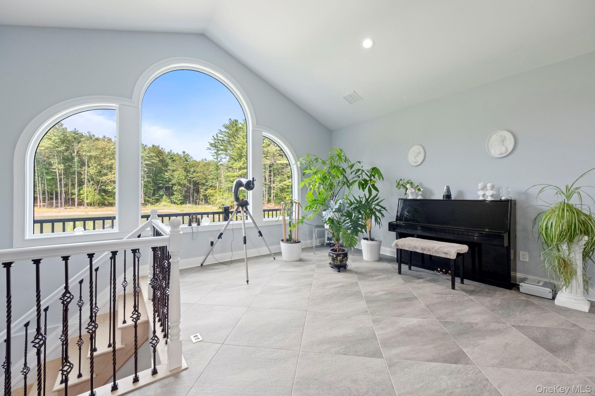 174 Webber Road Coxsackie, NY 12058 - Photo 10 of 50 a living room with furniture and a large window