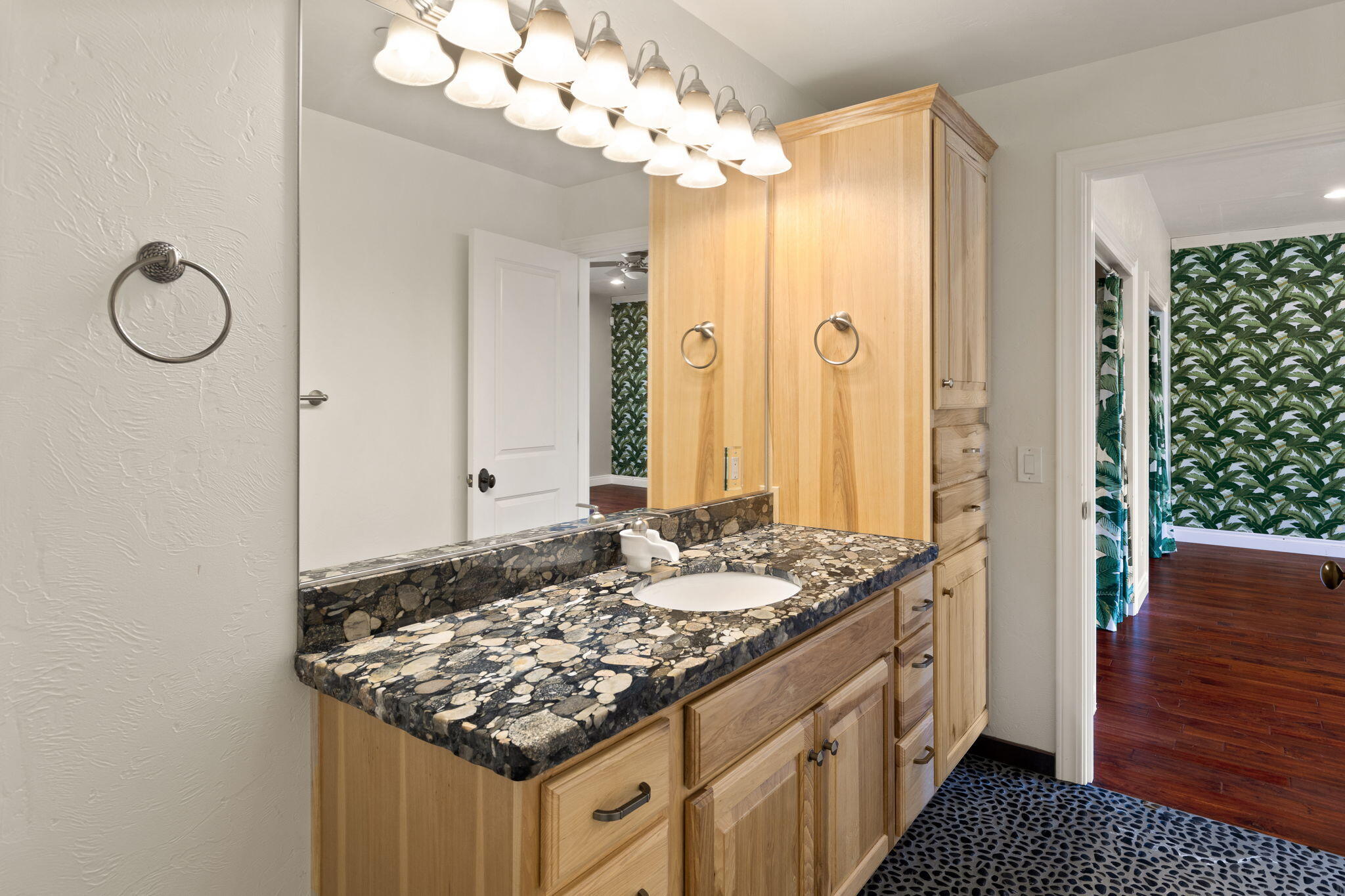 7304 North Applegate Road Grants Pass, OR 97527 - Photo 51 of 87 a bathroom with a granite countertop sink and a mirror