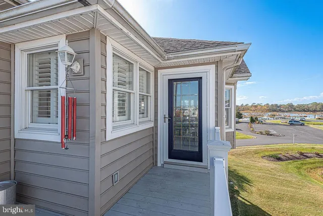 a bathroom with a double vanity sink a mirror and a shower