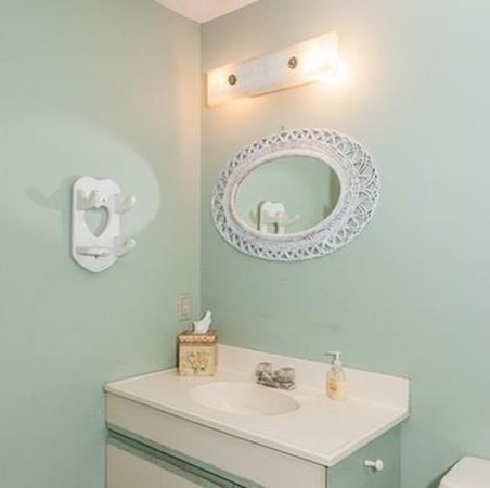 185 Monson Turnpike Road Ware, MA 01082 - Photo 19 of 24 a bathroom with a sink and a mirror