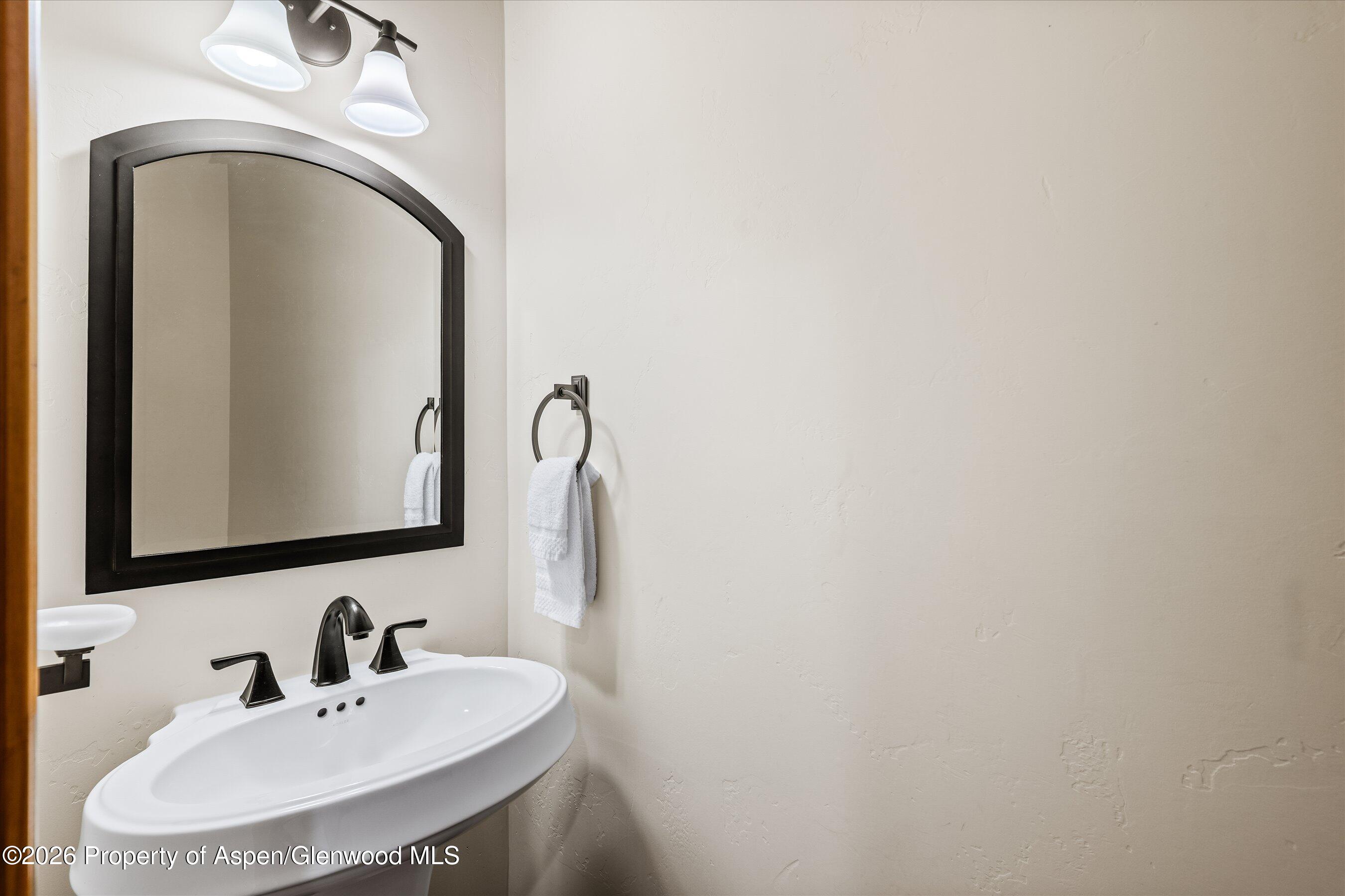 323 Faas Ranch Road New Castle, CO 81647 - Photo 24 of 33 main level powder room