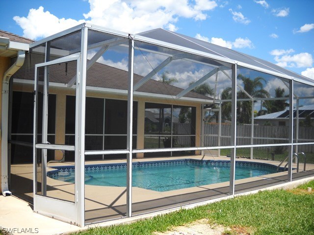 225 Danby Road Lehigh Acres, FL 33936 - Photo 7 of 20 a view of a backyard
