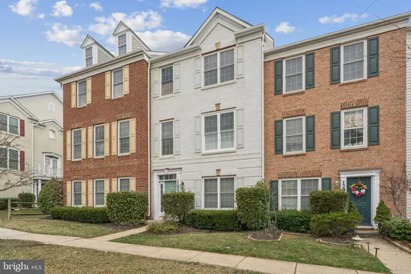 a view of a building next to a yard