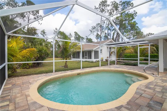 front view of a house with a swimming pool