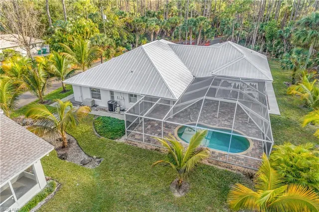 a house with trees in the background