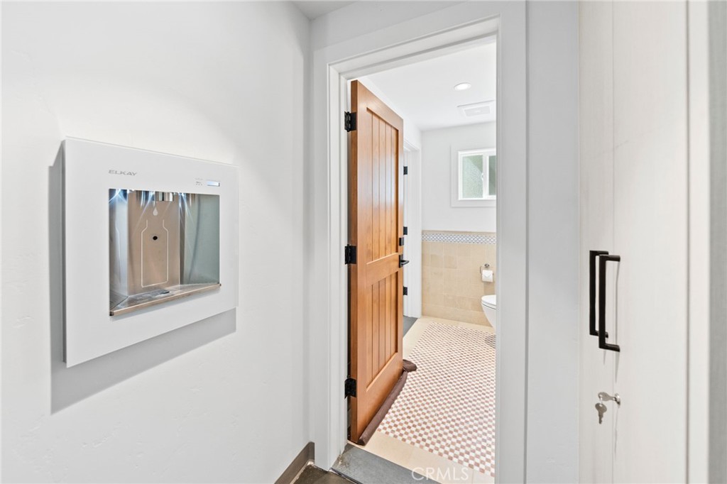 39893 Calle Breve Temecula, CA 92592 - Photo 63 of 70 a view of a bathroom from a hallway