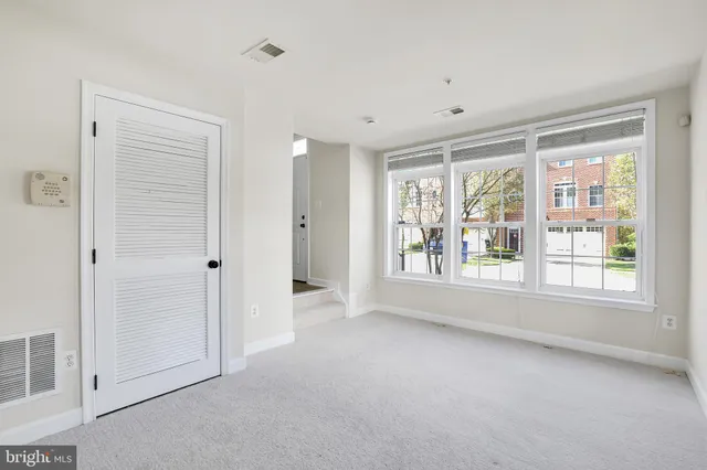 a view of a street with a building