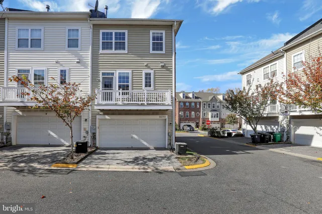 a view of a street with a building in the background