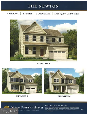 a view of houses with a street