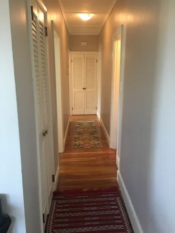 a view of a bathroom from the hallway
