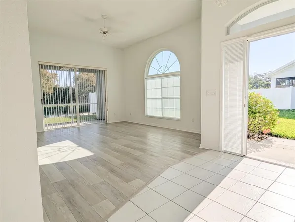 a kitchen with a sink cabinets and window