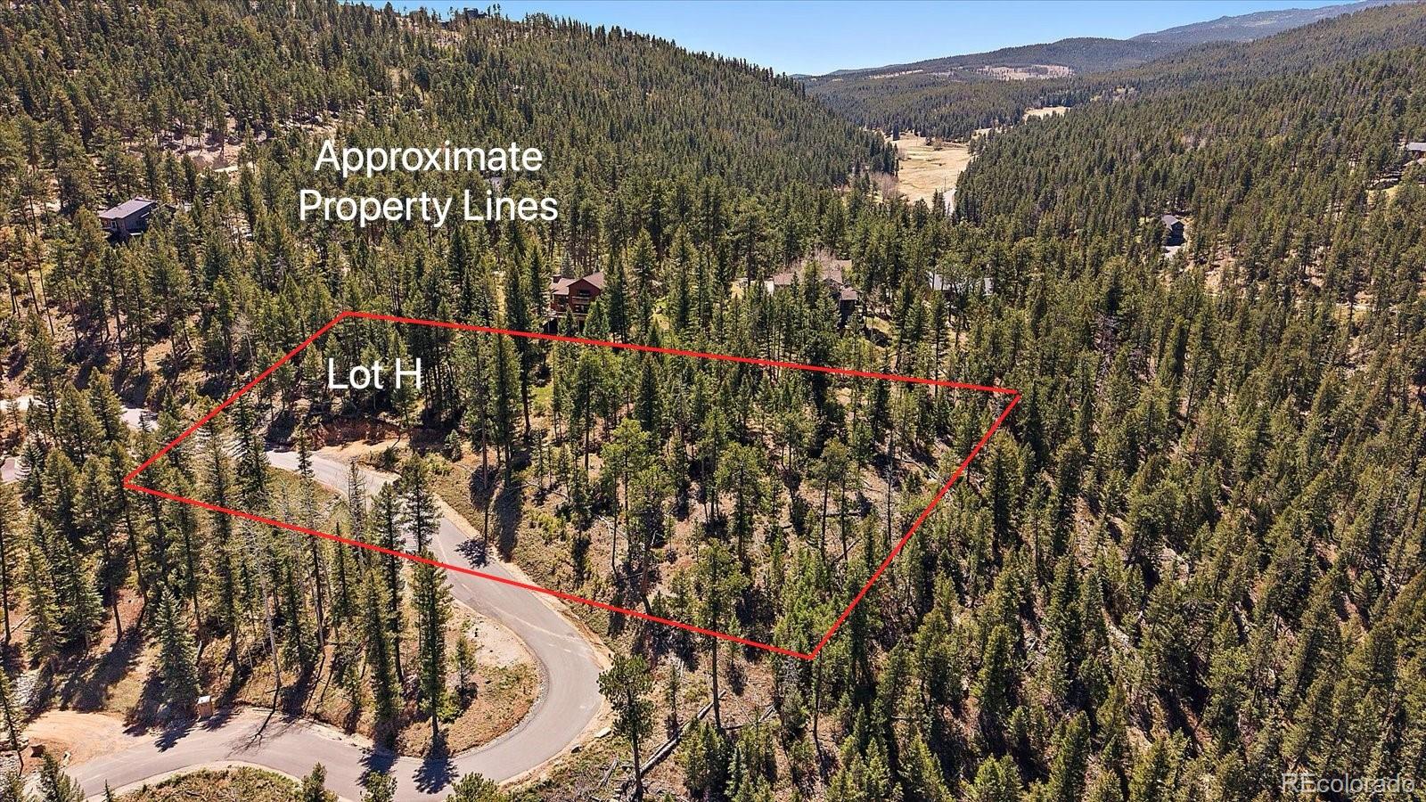 6855 Lynx Lair Road Evergreen, CO 80439 - Photo 3 of 21 a view of city and mountain