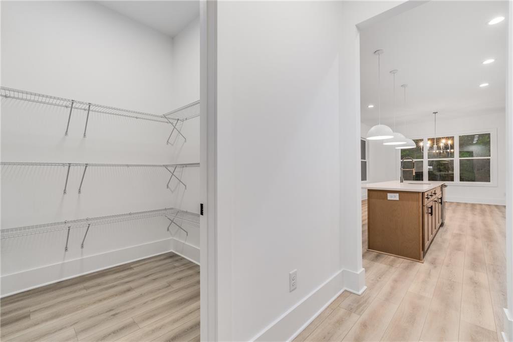 3766 Cheyenne Lane Jefferson, GA 30549 - Photo 17 of 52 a view of a kitchen with wooden floor and electronic appliances