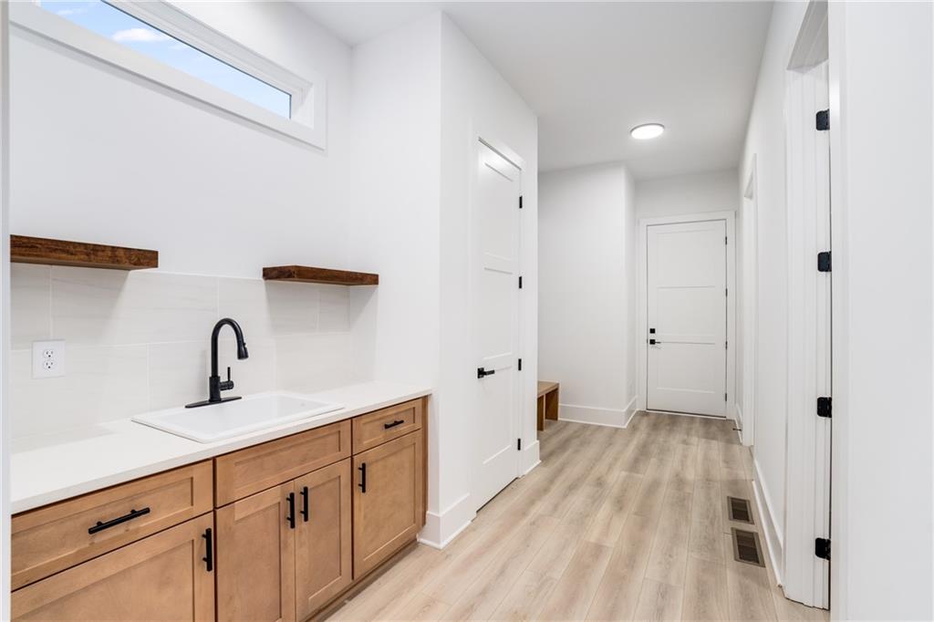3766 Cheyenne Lane Jefferson, GA 30549 - Photo 18 of 52 a kitchen with cabinets and sink