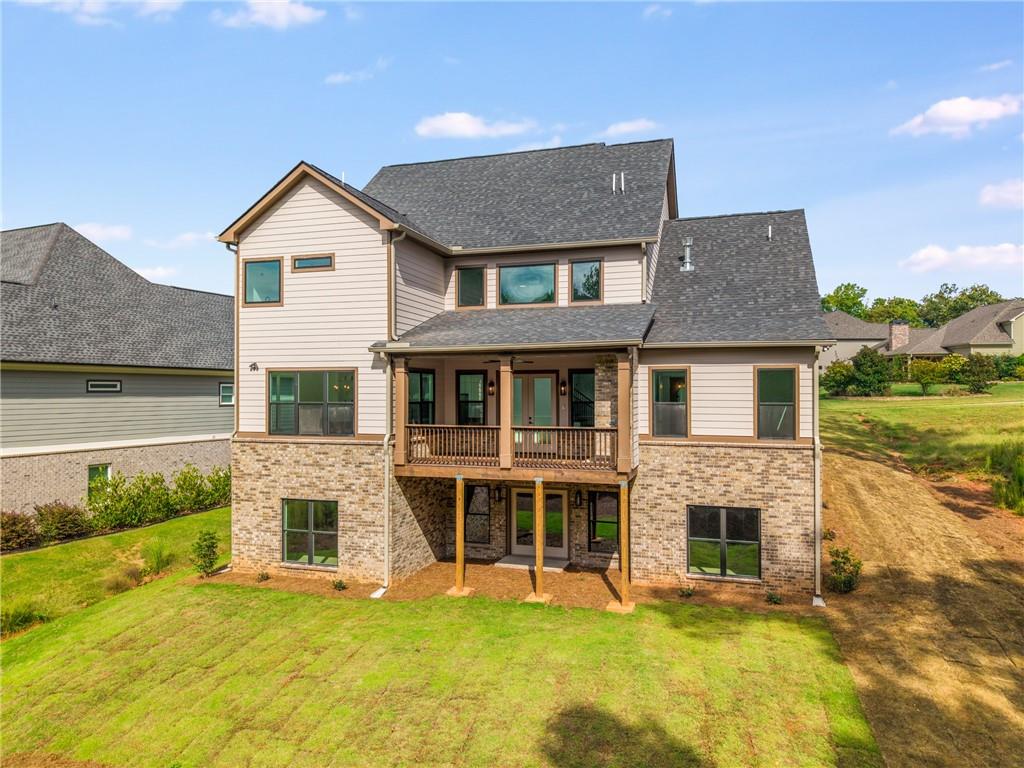 3766 Cheyenne Lane Jefferson, GA 30549 - Photo 44 of 52 a view of a house with pool and chairs next to yard